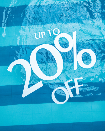 Spa pool with floats that read "Up to 20% off"