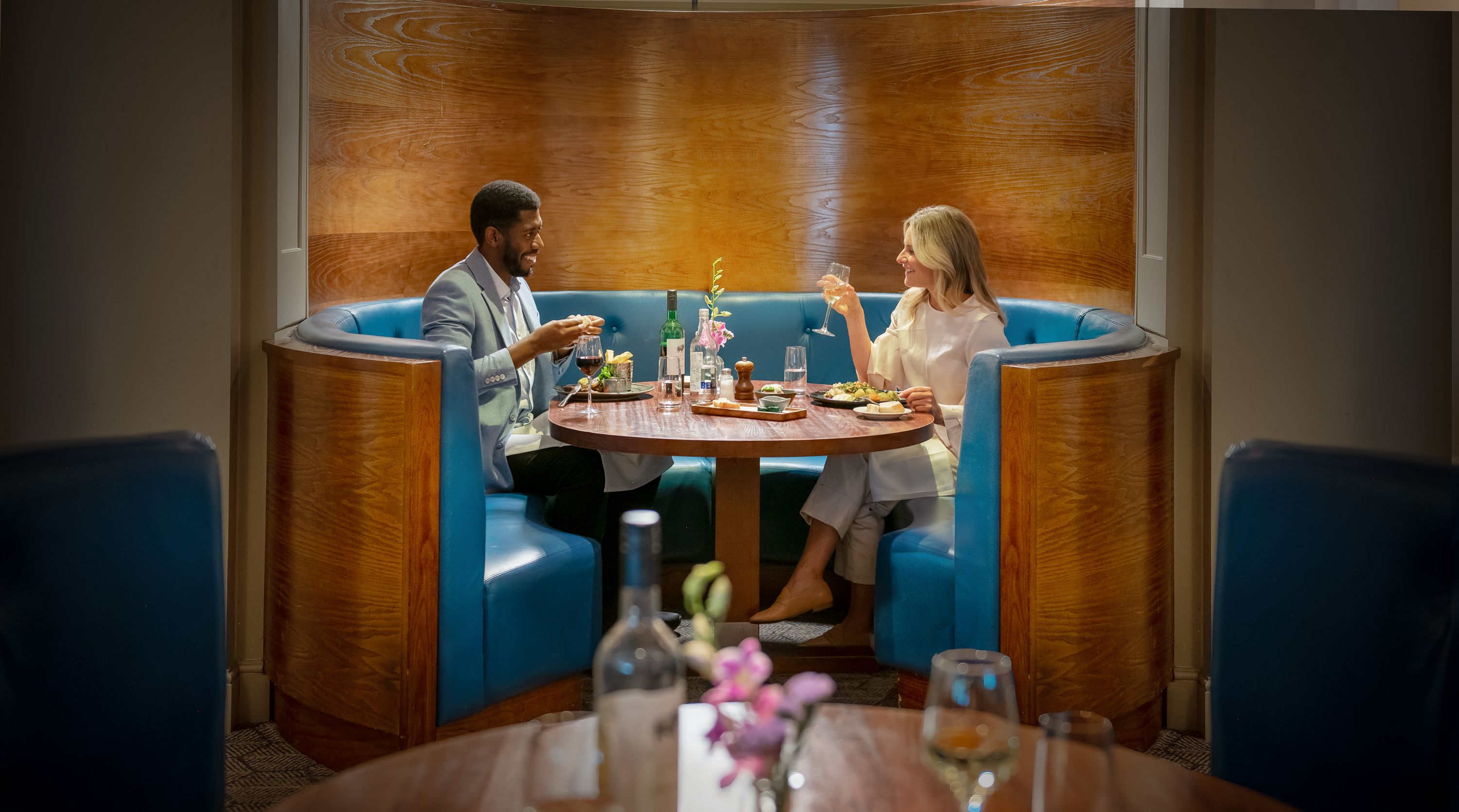Couple dining in a booth